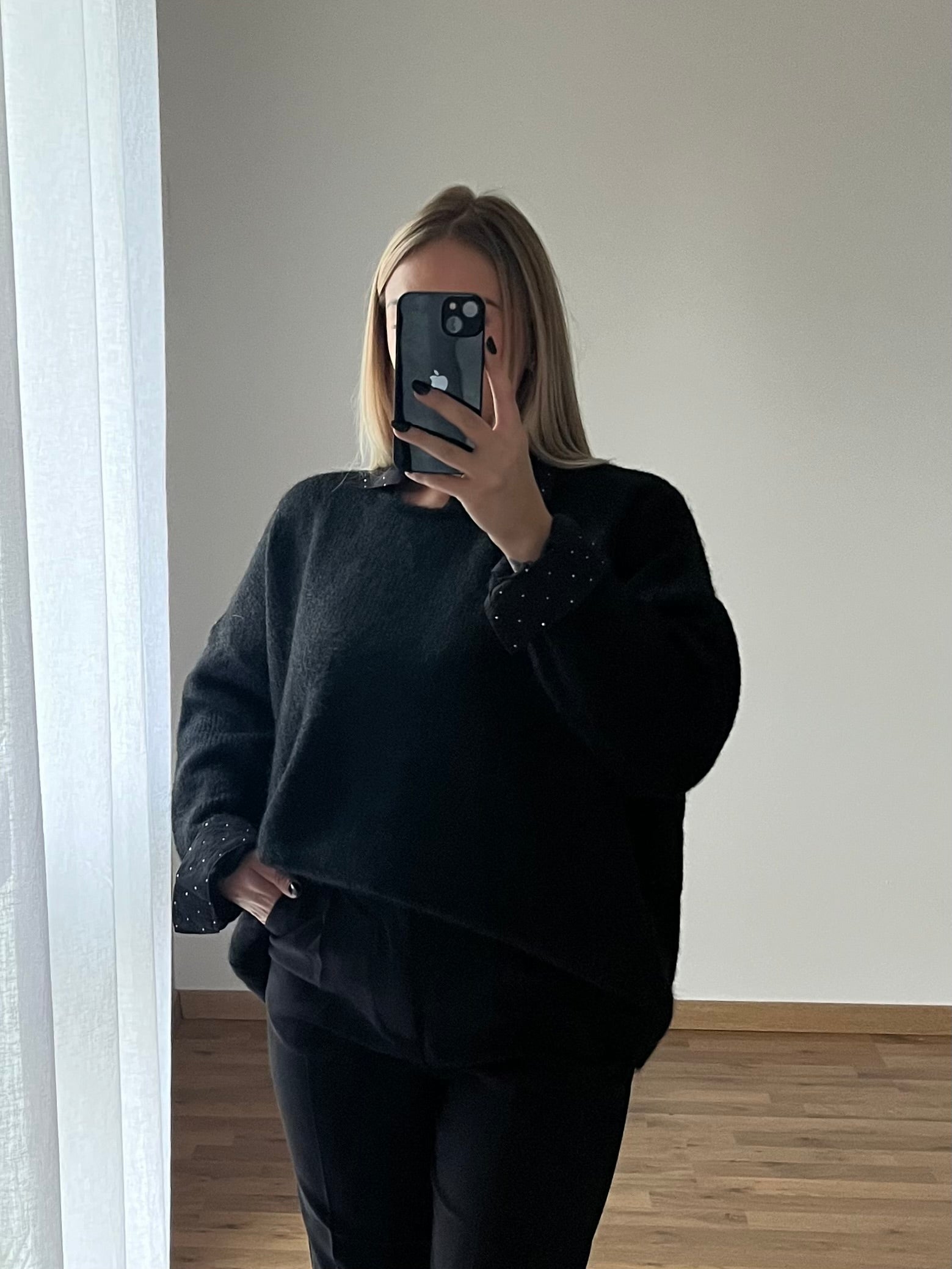 Pull noir à col rond