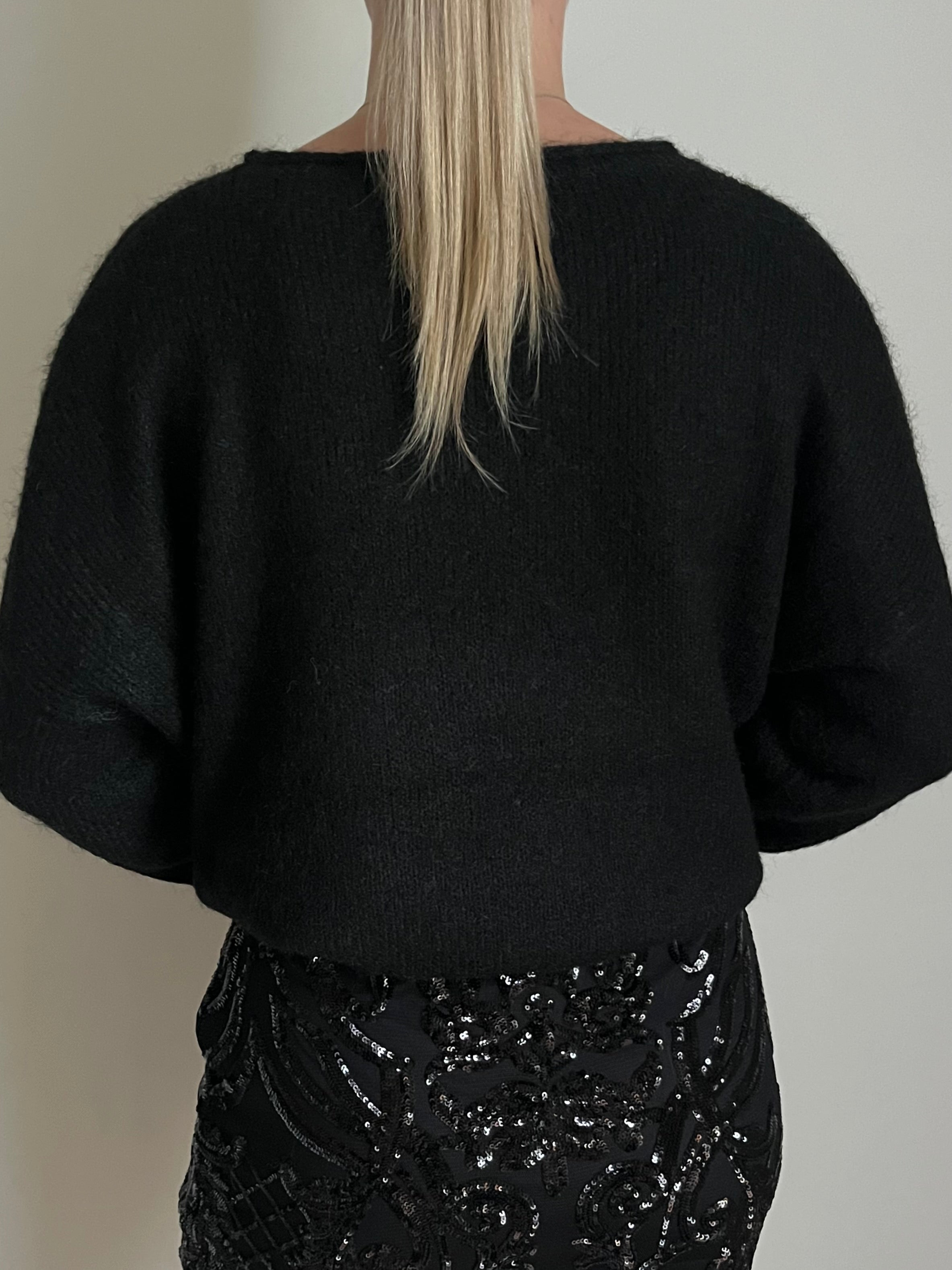 Pull noir à col rond